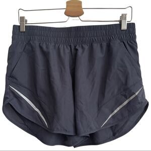 Athletic Works Ladies gray running shorts reflective details on legs size MEDIUM